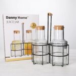 2-Bottle Glass Juice Carafe Pitcher and Condiment Cruet Set with Natural Wood Cork Stoppers and Black Metal Wire Stand Holder - SD-033 - Image 3